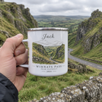 White enamel mug with silver rim, held in hand; 'Jack' name and Winants Pass artwork