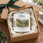 White enamel mug in gift box with silver rim, 'Olivia' name and mountain route print