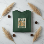 Forest green crewneck sweatshirt with 'LIKE A PINE' themed front graphic