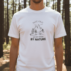 White graphic T-shirt with centered mountain and trees logo and “BY NATURE” text