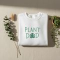 Arctic white crewneck sweatshirt with Plant Dad graphic on the front, long sleeves