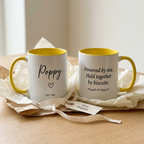 Poppy EST. 1992 yellow mug with a funny tea and biscuits quote, styled with gift wrapping