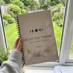 A5 lined notebook with cream cover, moon design, Trust the Timing of Your Life—POPPY
