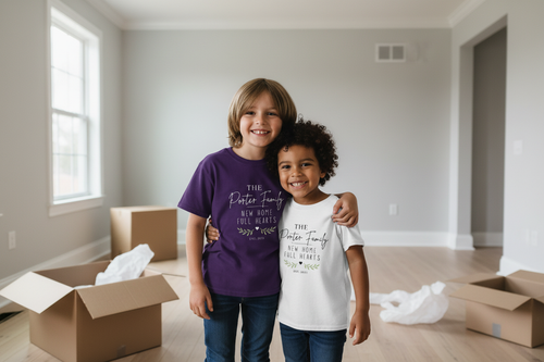 Kids purple short-sleeve tee with “The … Family” “New Home Full Hearts” design