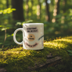 White ceramic mug with “EVERYTHING WILL BE OKAY” and “I’M STRONG” printed design