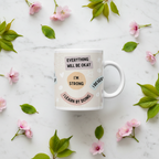 White ceramic positivity mug with 'Everything will be okay', 'I'm strong', and 'Learn by doing'