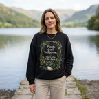 Black crewneck sweatshirt with front plant graphic, worn by a model