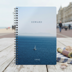Premium coastal mockup of the Edward 1992 calm sea notebook