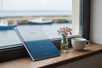 Premium coastal mockup of the Harry 2015 calm sea notebook