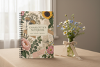 Premium mockup of the Charlotte notebook with wildflowers