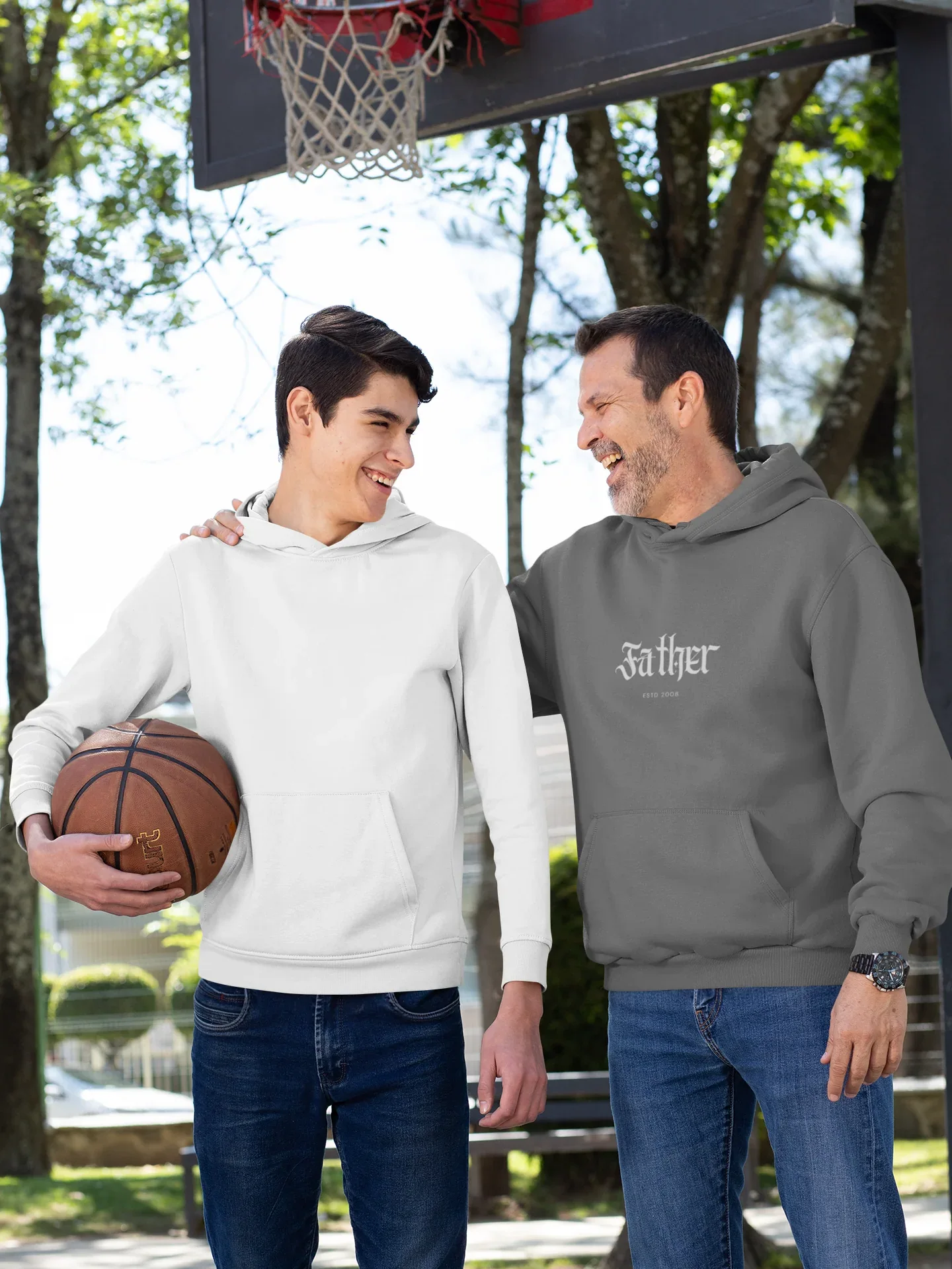White and gray pullover hoodies, each with hood and front pouch pocket, “Father” logo