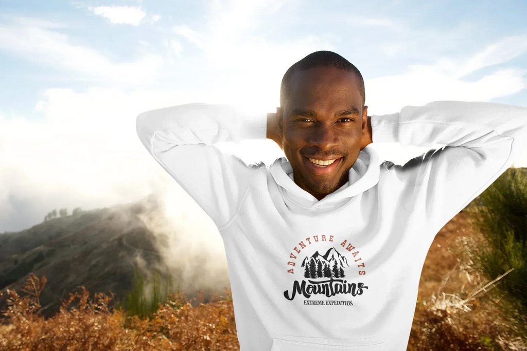 White hoodie with hood and Adventure Awaits mountain logo on chest