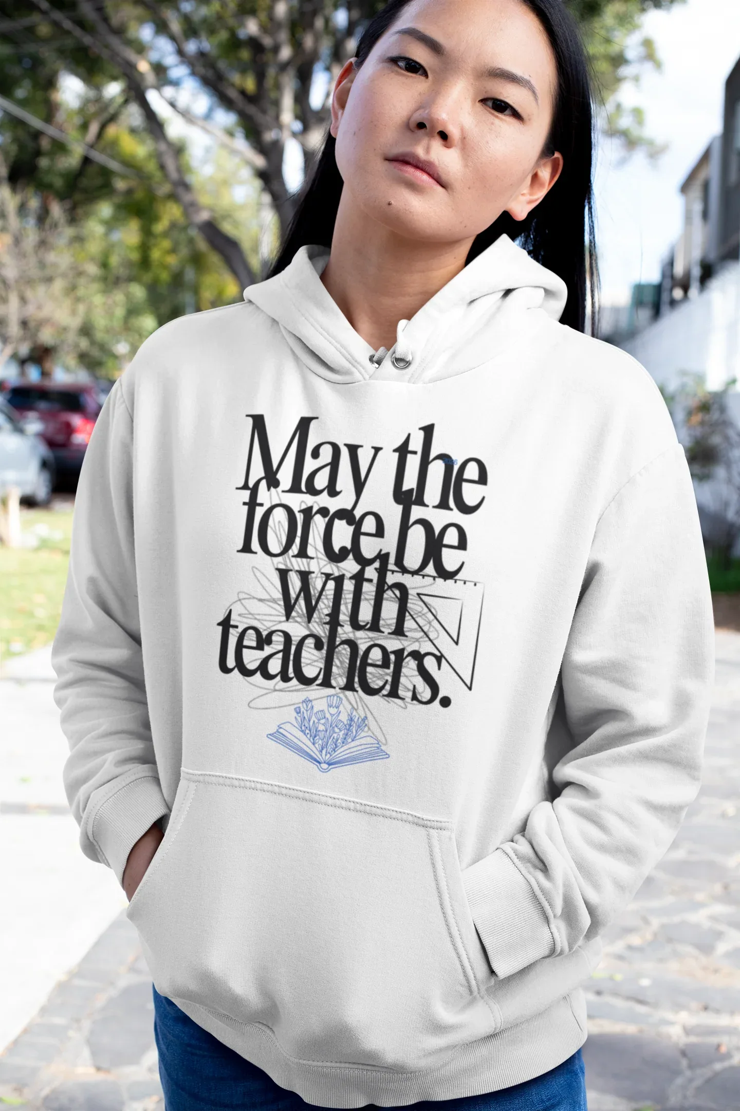 Light gray/white hooded sweatshirt with front graphic and blue book emblem.