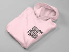 Pink hoodie laid flat with hood and Earth Girl Energy chest logo