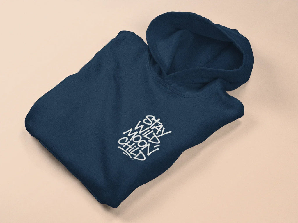 Navy minimal graphic hoodie with hood and “Stay Wild Moon Child” chest print, laid flat