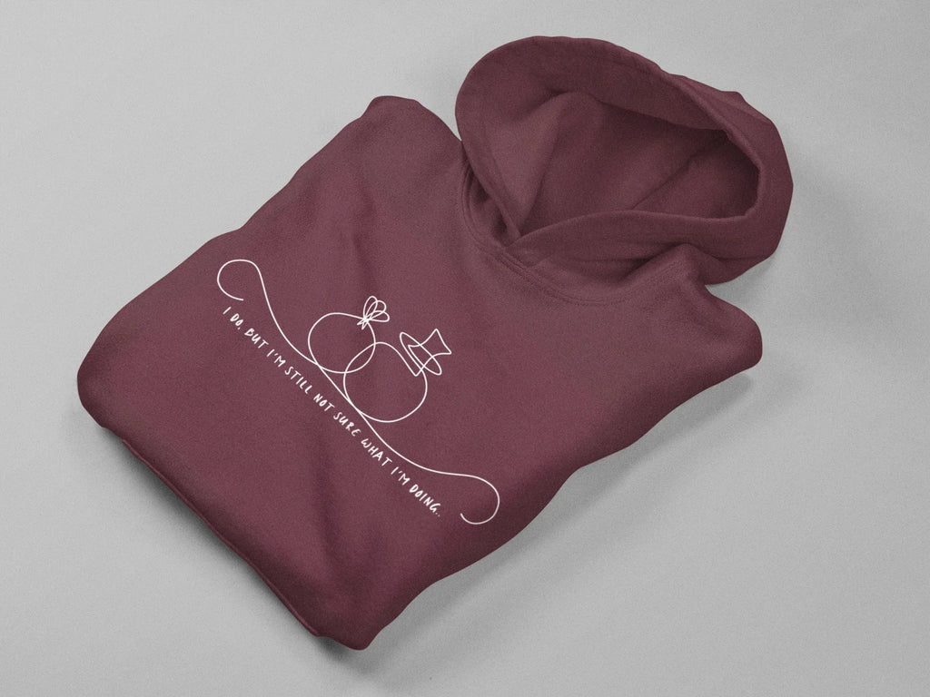 Maroon unisex hoodie, folded view, hood and pouch pocket with front line-art graphic