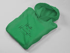 Irish green hooded sweatshirt folded with front pouch pocket and chest script graphic