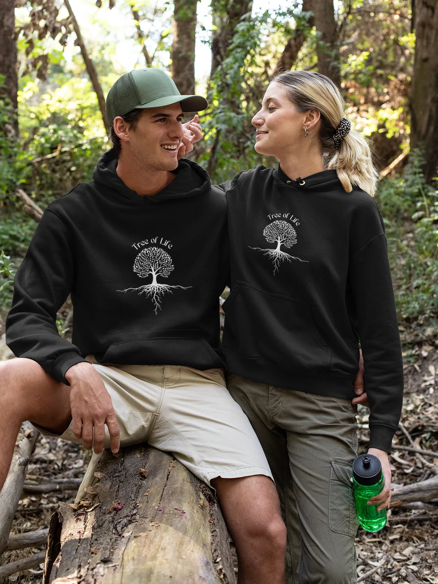 Black hoodie sweatshirt with Tree of Life tree graphic on chest, hood and front pocket