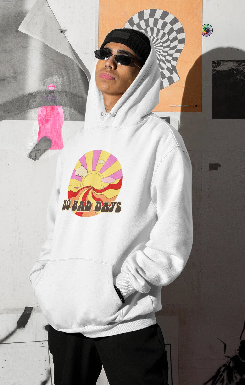 White unisex hooded sweatshirt with colorful sun graphic and front pouch pocket