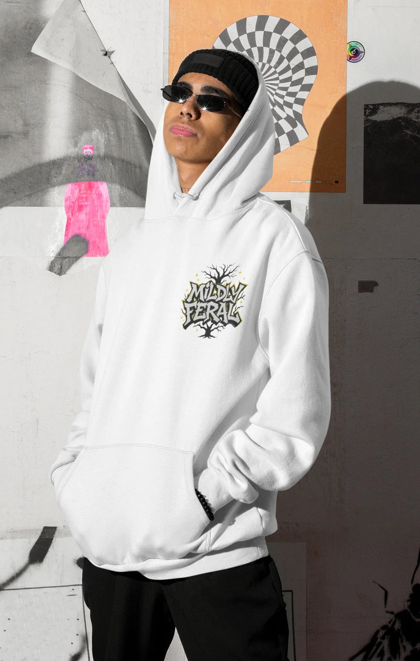 White graphic hoodie with small chest “Mildly Feral” logo and front pouch pocket
