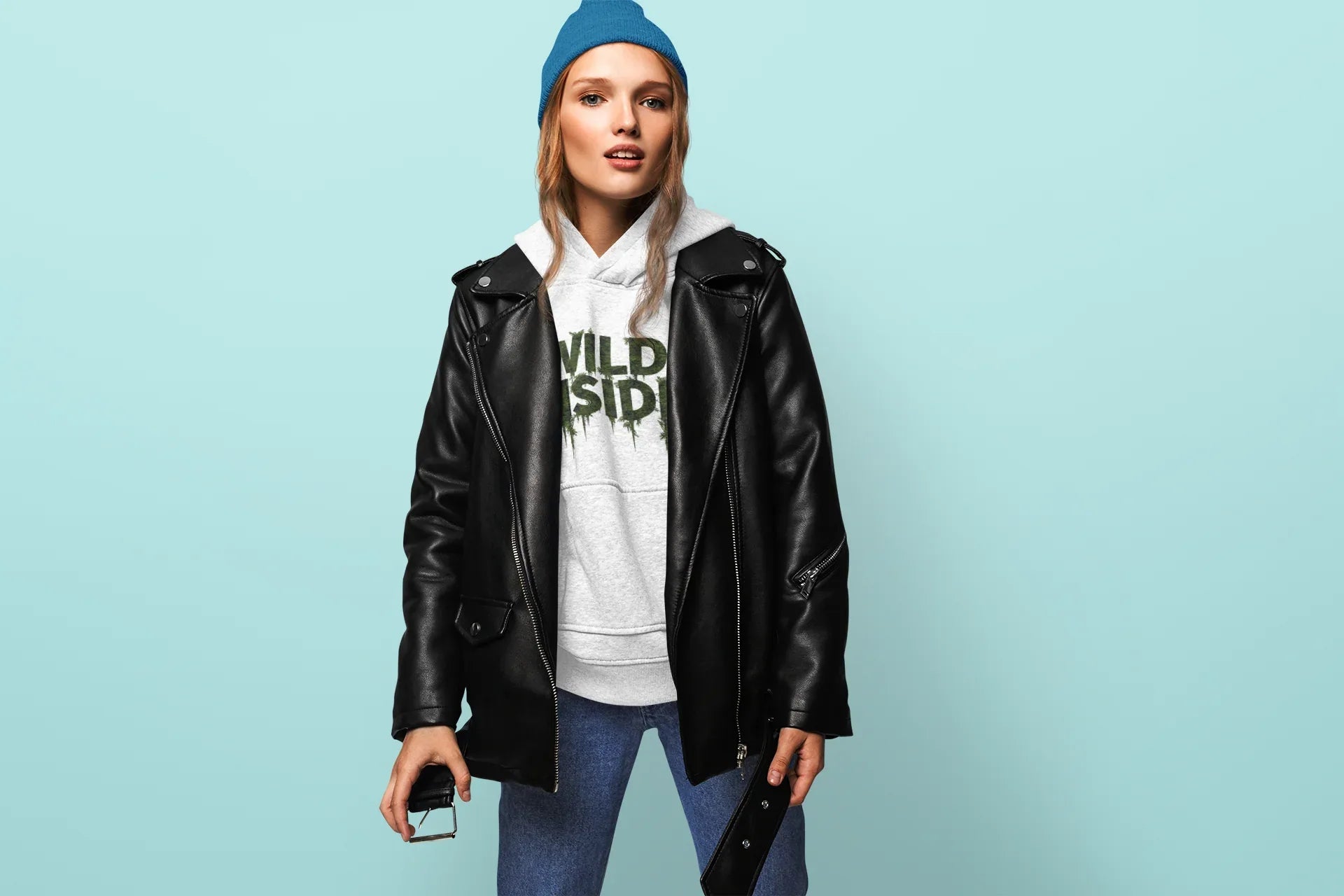 White hoodie with 'WILD INSIDE' graphic under a black jacket, pullover hood and pocket
