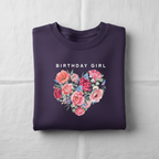 Purple sweatshirt with "BIRTHDAY GIRL" text and floral heart graphic