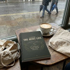 Quiet Life notebook on a British café table