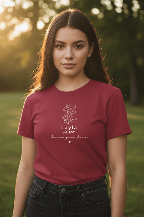 Maroon T-shirt with botanical line art and "Layla" text on front