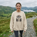Sand crewneck sweatshirt with front mountain quote graphic, worn outdoors