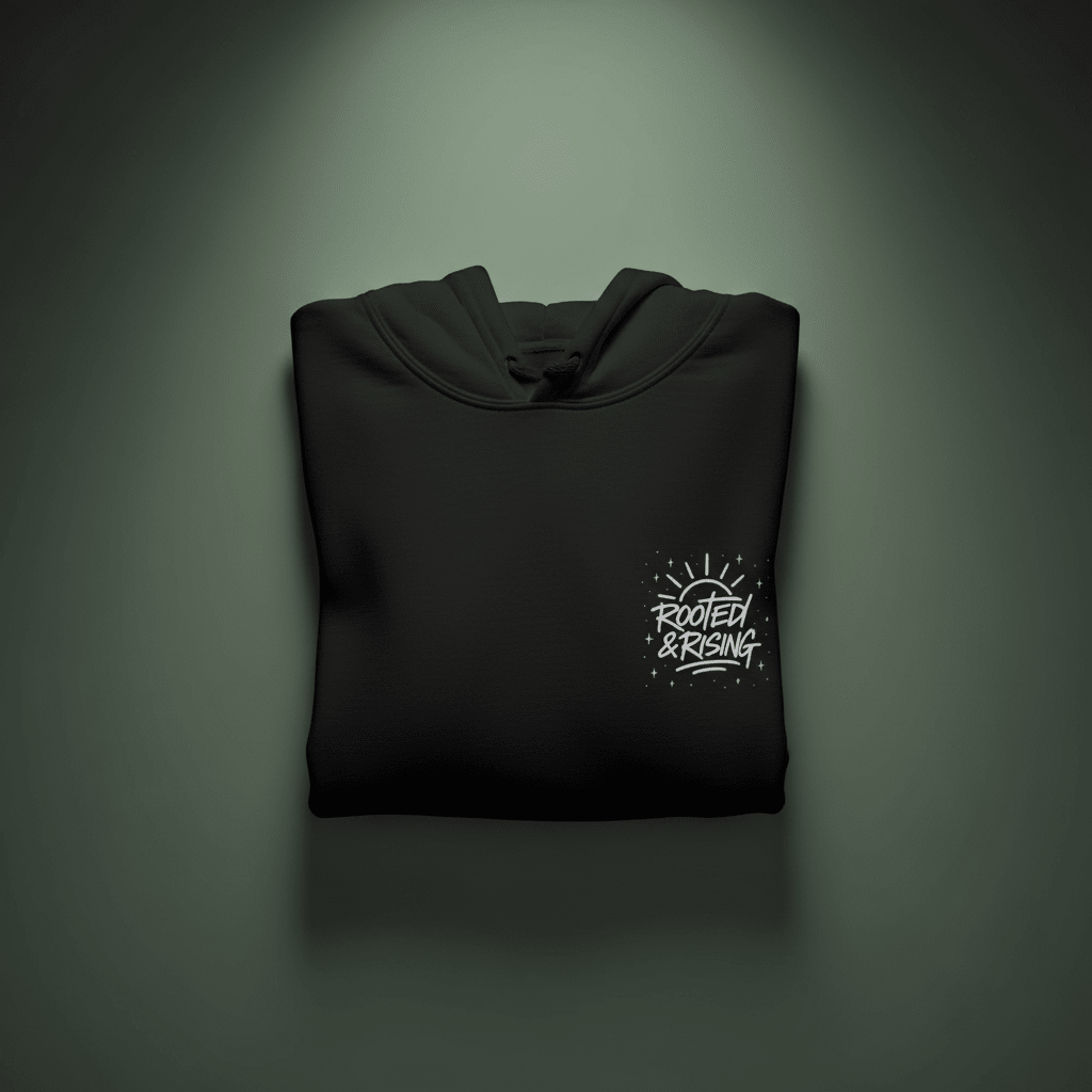Black folded hoodie with front pocket and small chest logo graphic.