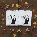 Two white personalised hoodies with couple line-art graphic and names printed underneath