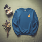 Royal blue crewneck sweatshirt with peace-sign hand embroidery on the chest