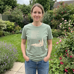 Sage green hiking t-shirt with woodland scene graphic and quote, worn by model