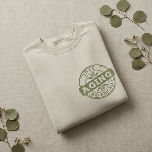 White sweatshirt with crew neck and green circular logo print on chest.