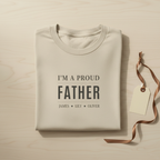 Sand dad T-shirt with 'I'M A PROUD FATHER' text and names JAMES • LILY • OLIVER