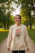 Cream crewneck sweatshirt worn by model, featuring Take a Deep Breath floral graphic