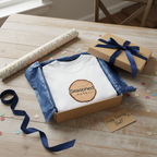 White crewneck T-shirt with brown tree-ring “Seasoned” graphic