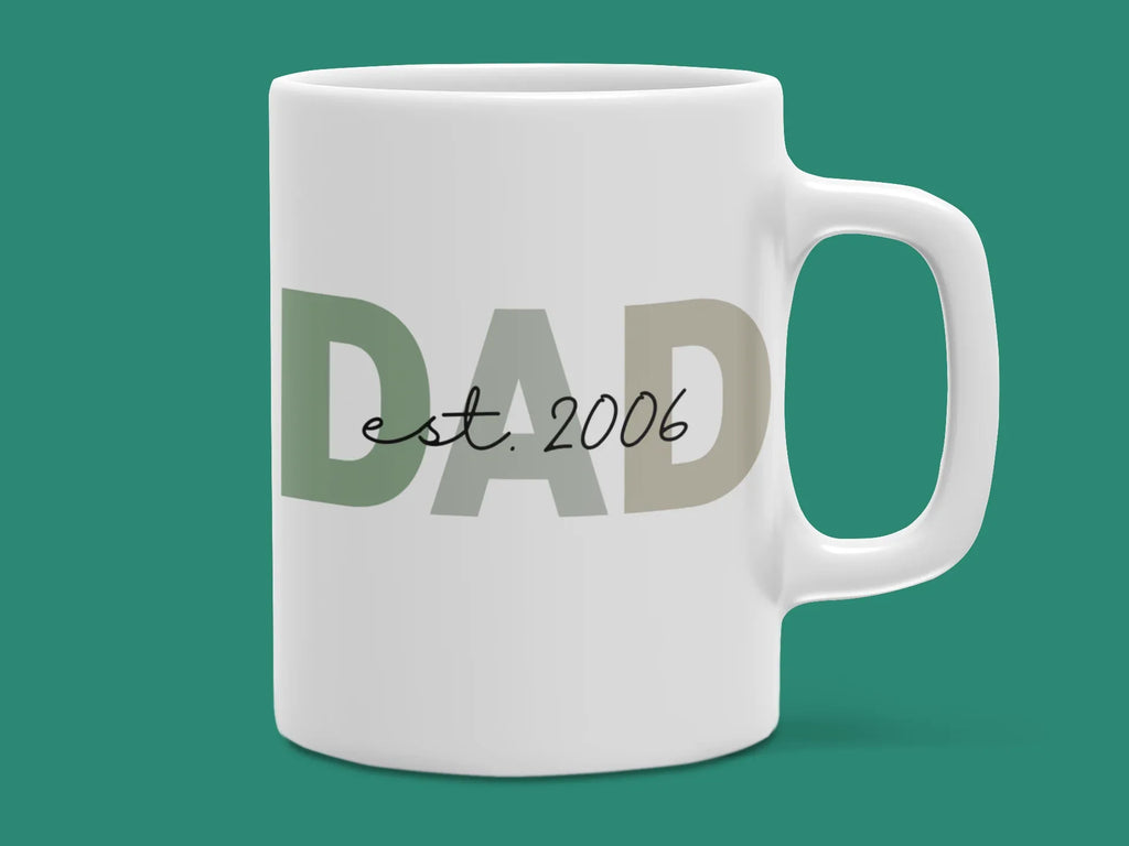 White ceramic coffee mug with DAD and Est. 2006 print on front