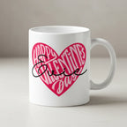 White ceramic mug with pink heart “Happy Valentine’s Day” logo