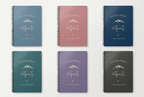 A5 hiking notebook with spiral binding, blue, pink, and dark cover designs