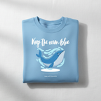 Light blue sweatshirt with 'Keep the ocean blue' whale graphic, crewneck
