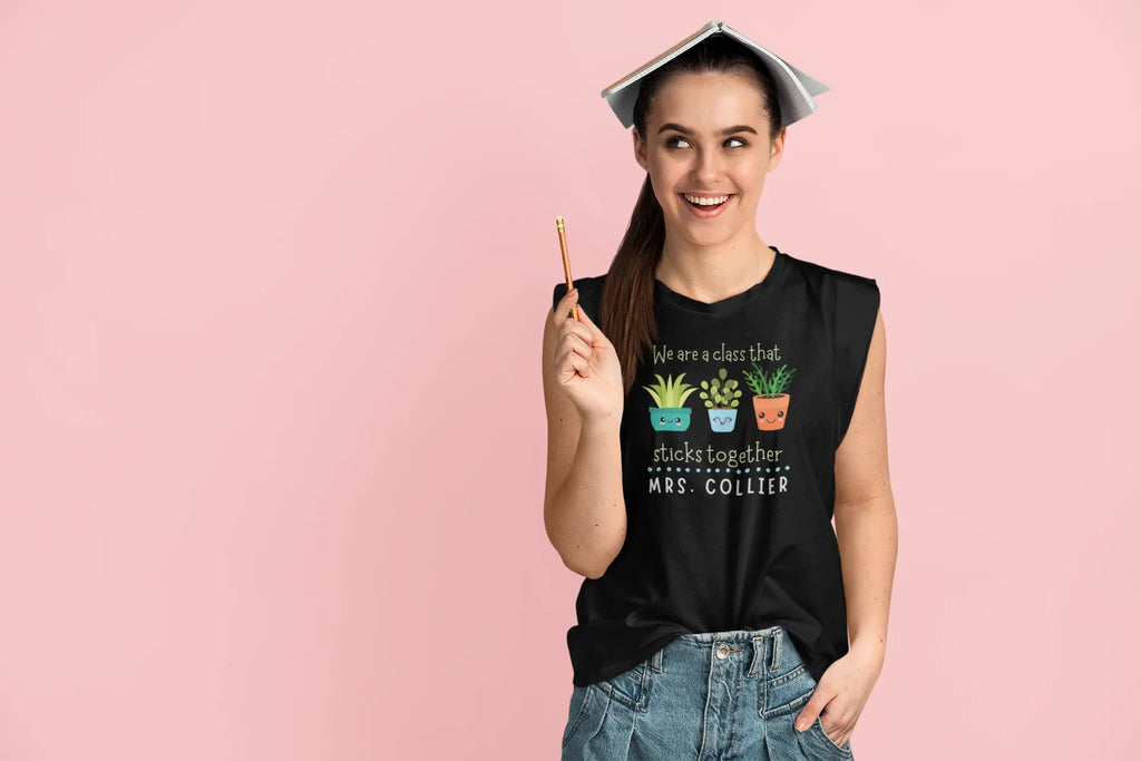 Black crewneck teacher T-shirt with cartoon plants and 'MRS. COLLIER' text.