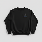 Black crewneck sweatshirt with “slow living” chest print and small badge