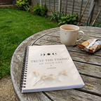 A5 lined notebook with cream cover, moon design, Trust the Timing of Your Life—SOPHIE