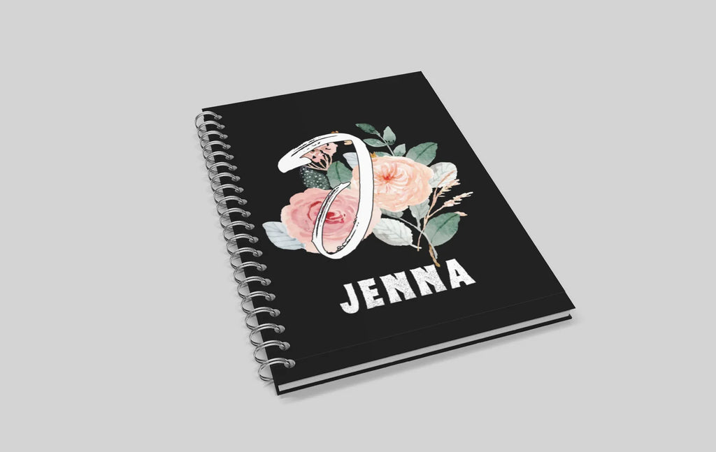 Black wirobound A5 journal with floral initial and name JENNA on the cover