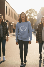Light blue crewneck sweatshirt with 'Completed Another Orbit' wreath graphic