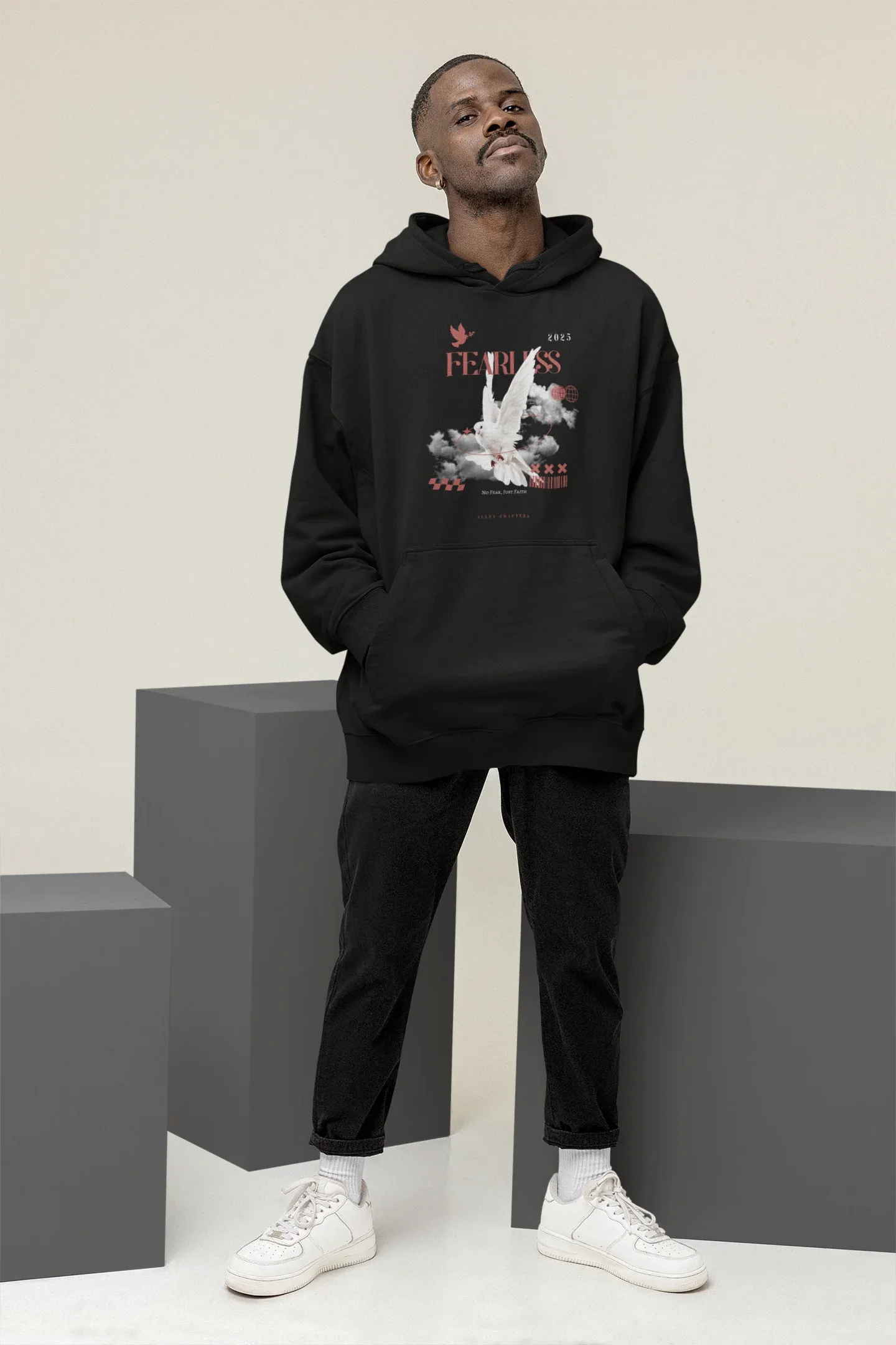 Black unisex hoodie with hood and front graphic, relaxed fit