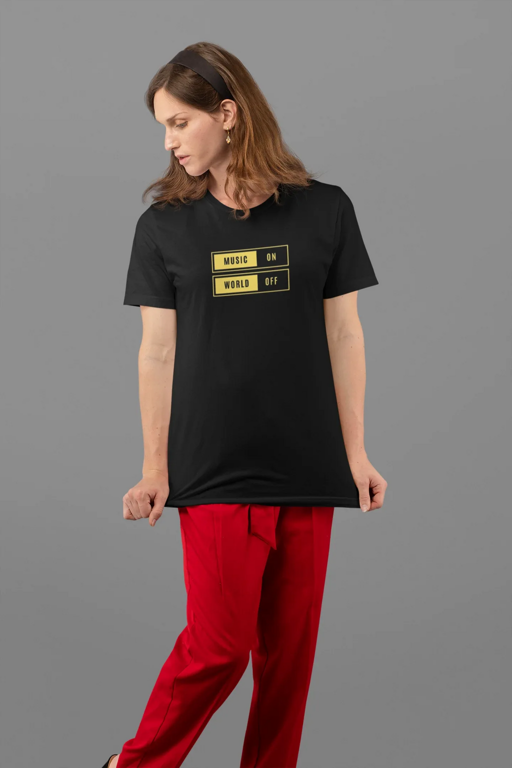 Black unisex T-shirt with “Music On / World Off” chest graphic