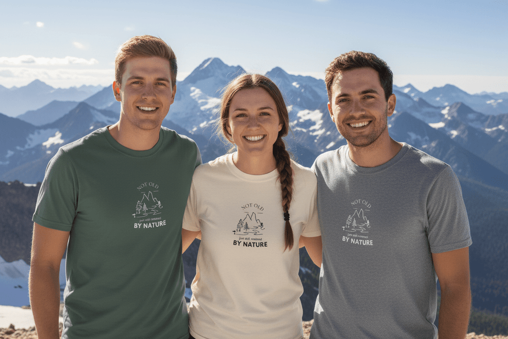 Nature graphic T-shirts on three people in green, white, and blue with chest logos