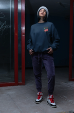 Navy crewneck sweatshirt with cherry embroidery patch on the left chest